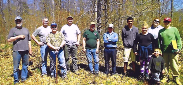 Group of mixed-age people in the woods